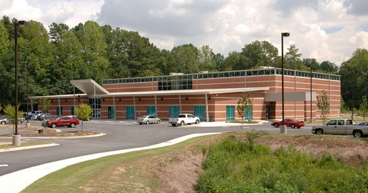 The exterior of the Carl Rhodenizer Recreation Center on a cloudy day