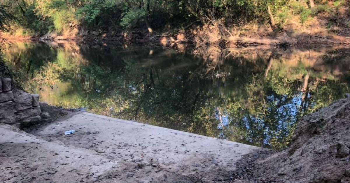 A small pond and beach at Etowah River Park