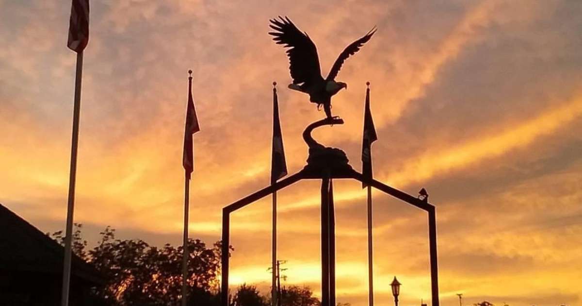 The exterior of Statham City Hall at sunset