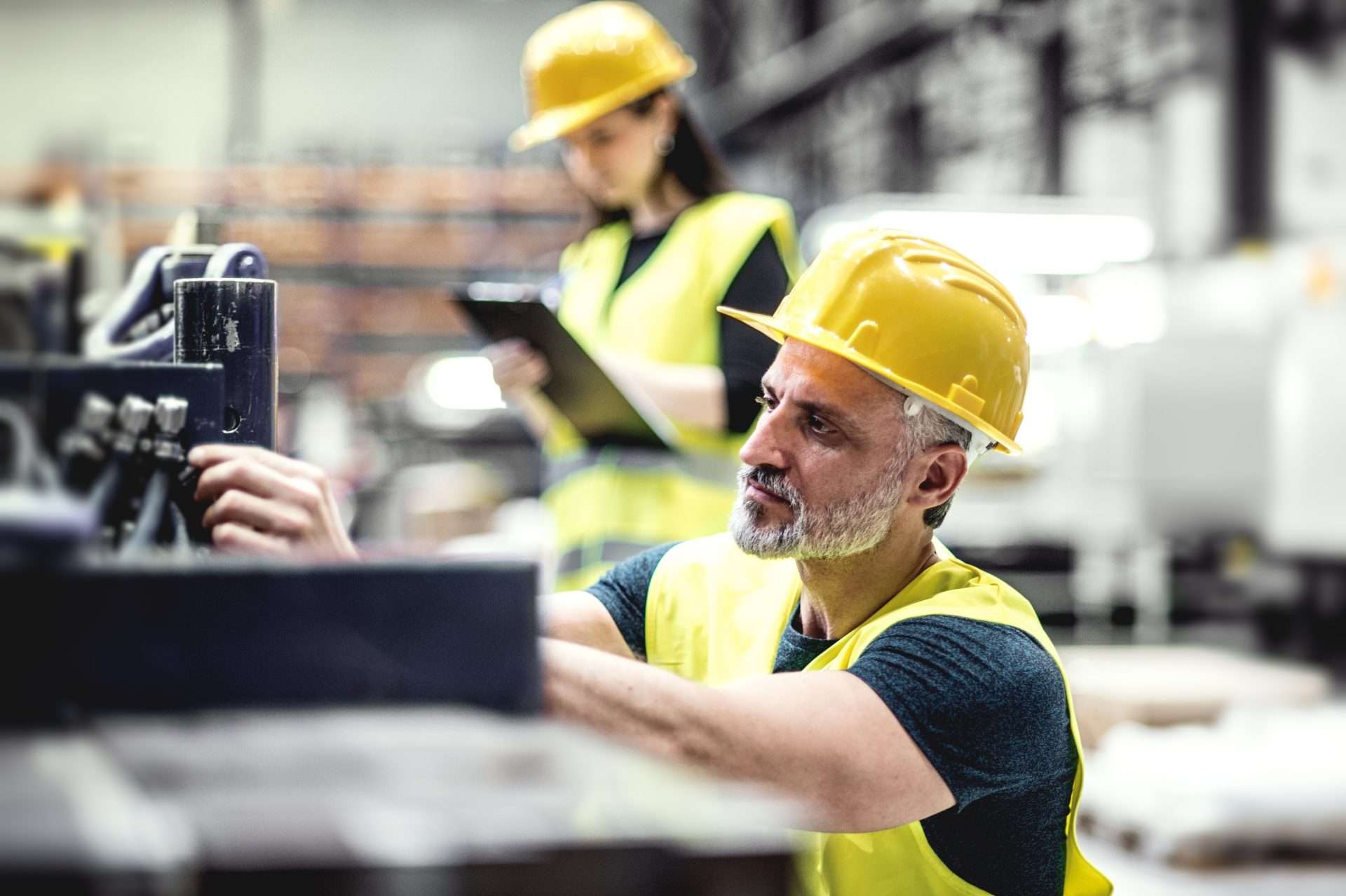 Warehouse,Employees,In,Warehouse.,Two,Workers,In,Reflective,Clothing,In