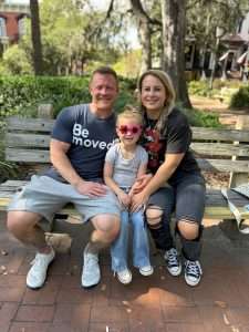 A photo of owner, Eric Wirks, and his family at the park
