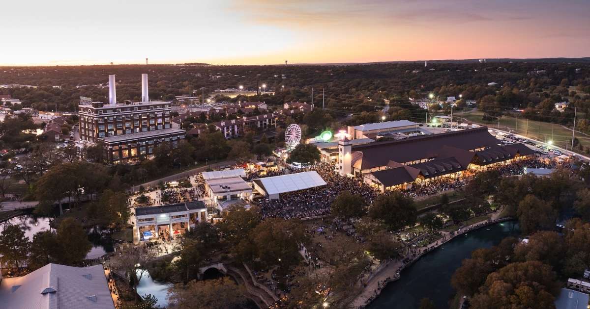 An aerial view of Wurstfest at sunset